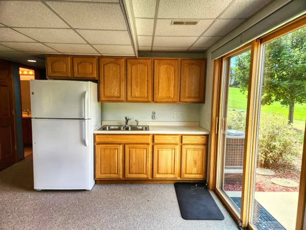 a dining room with a furniture and a window