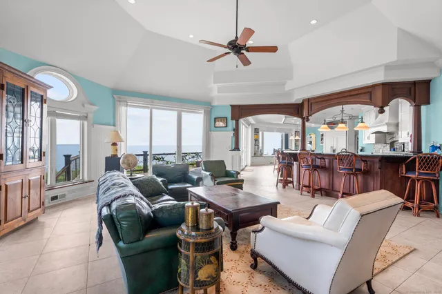 a large kitchen with stainless steel appliances lots of counter top space a sink and cabinets