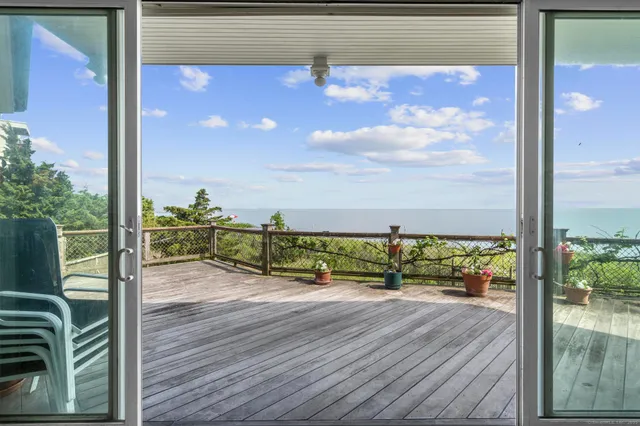 a dining room with furniture a rug a rug and a window