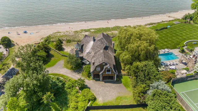 a view of a lake with a building in the background