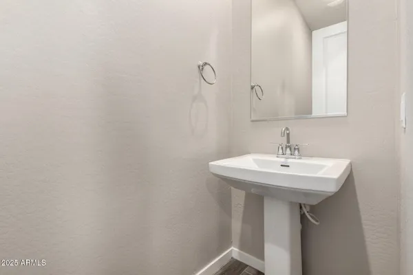 a stove top oven sitting inside of a kitchen