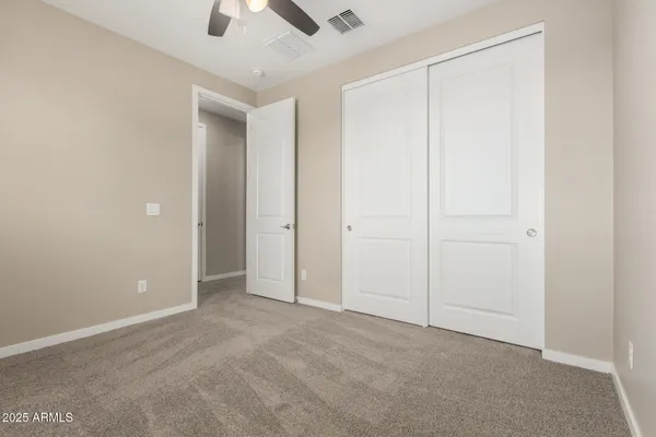 a spacious bathroom with a bathtub and shower