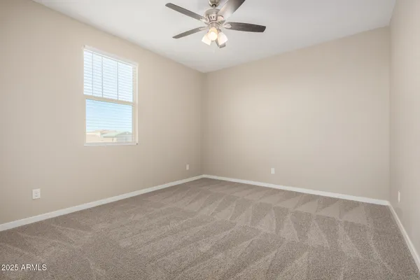a view of an empty walk in closet