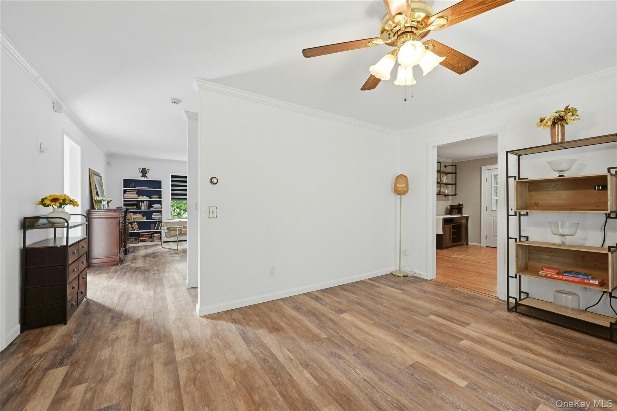 15 Birch Road Rocky Point, NY 11778 - Photo 10 of 30 Sitting Room looking back towards the Living room and Staircase to second floor