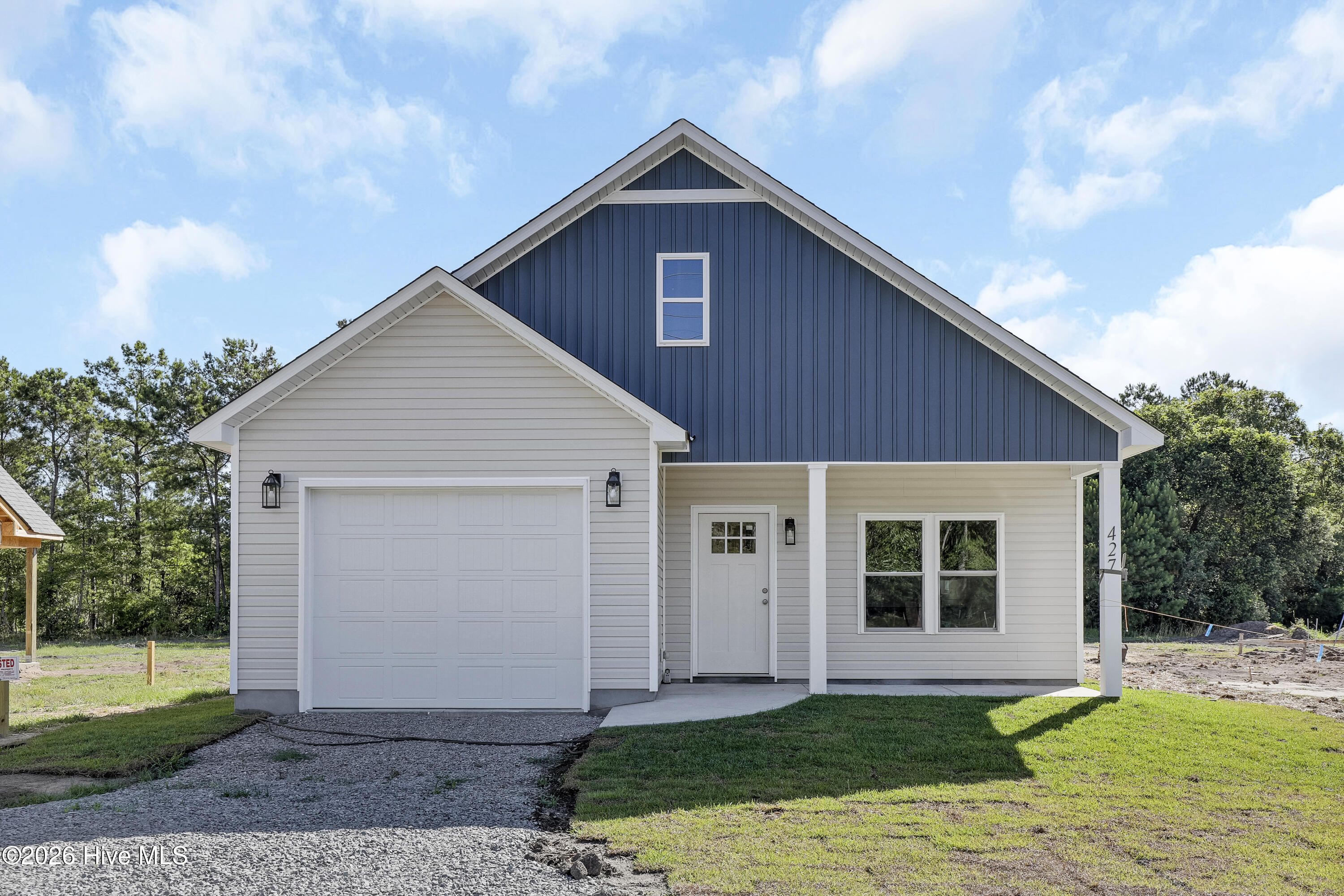 429 Morris Landing Road Holly Ridge, NC 28445 - Photo 2 of 28 Photos are of a similar home previously built by the builder. Finishes and floor plan may vary.