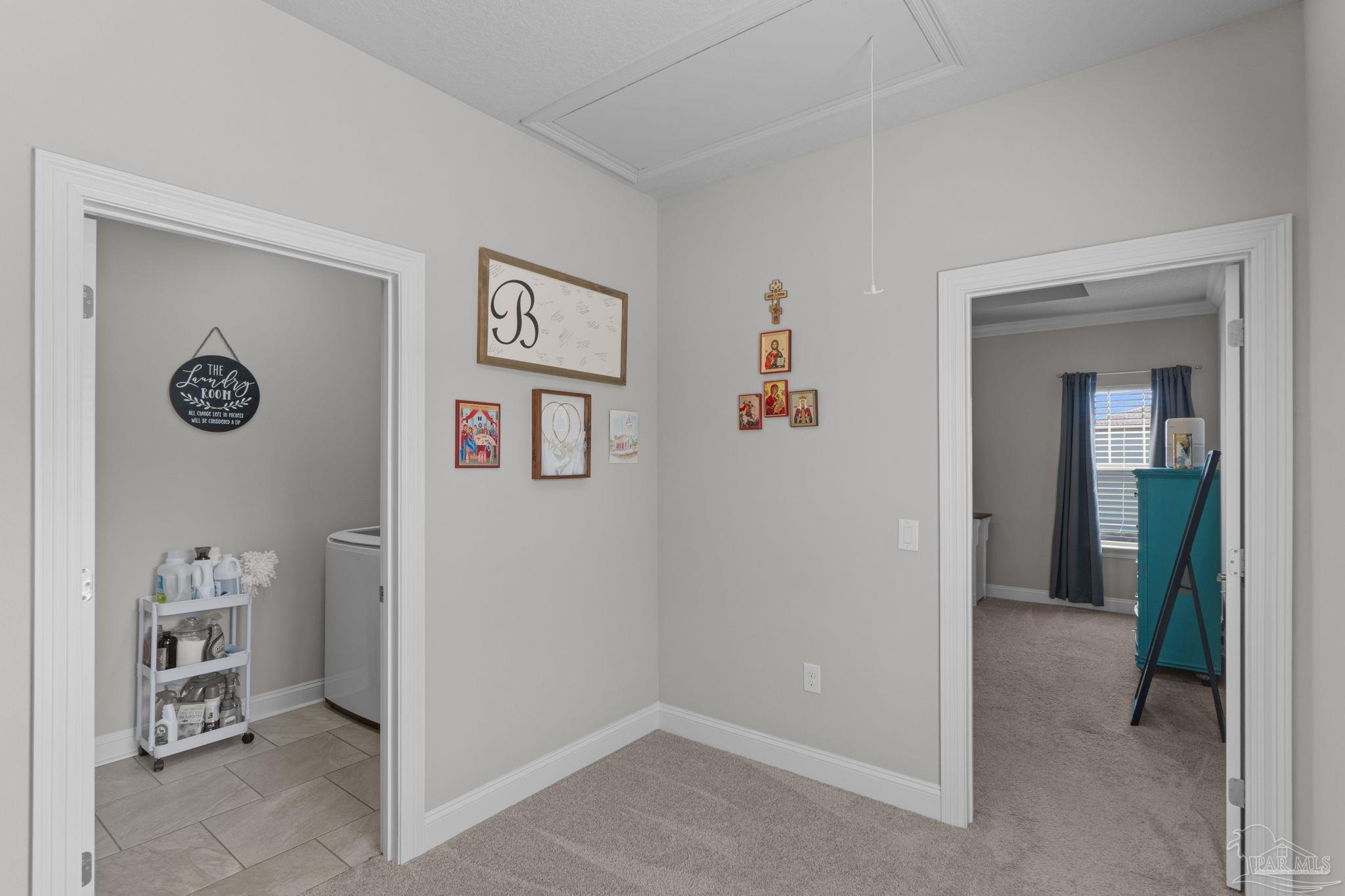 2770 Joe Pruitt Road Navarre, FL 32566 - Photo 23 of 58 a view of a hallway with closet