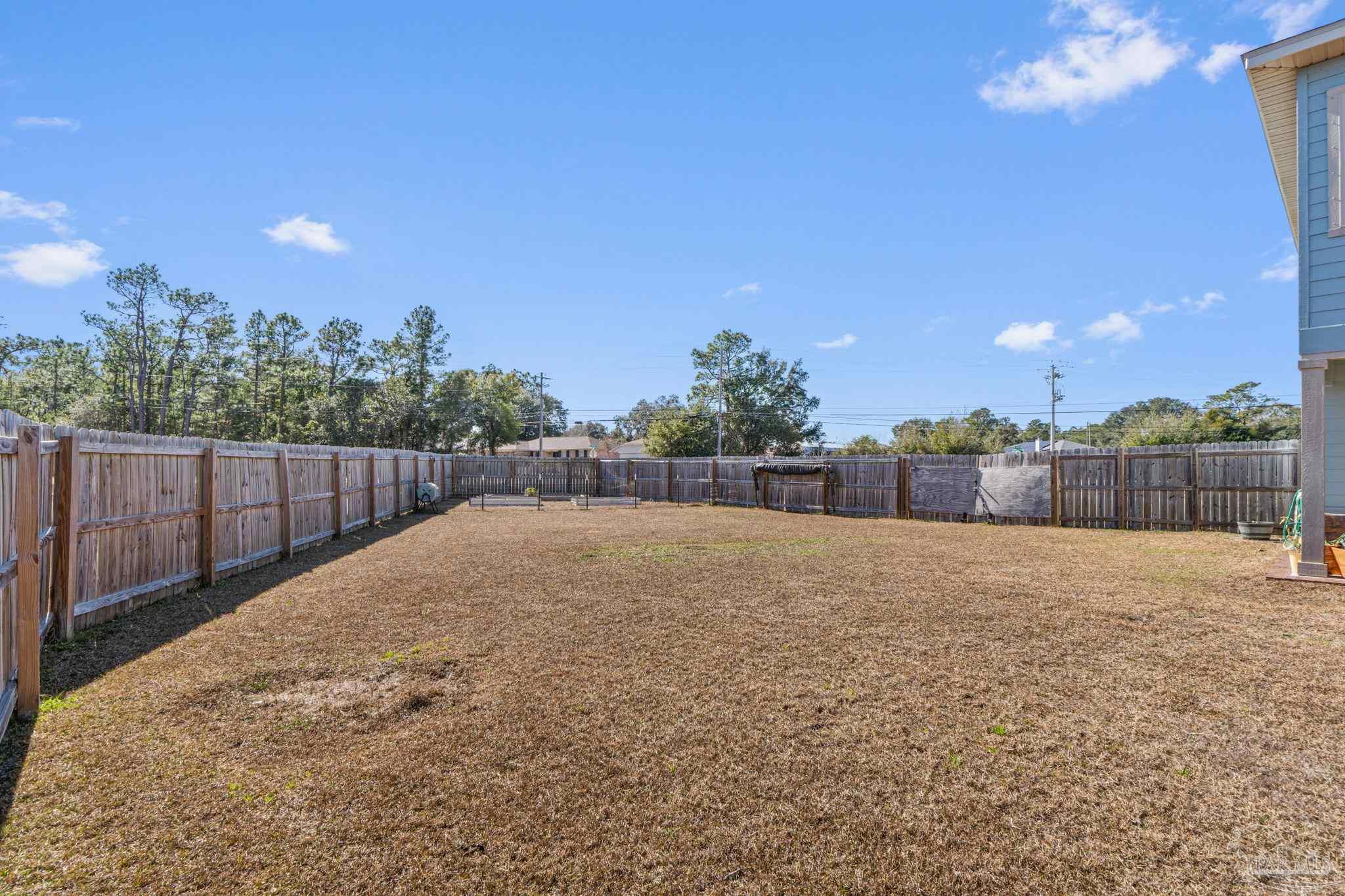 2770 Joe Pruitt Road Navarre, FL 32566 - Photo 47 of 58 a view of backyard and outdoor space