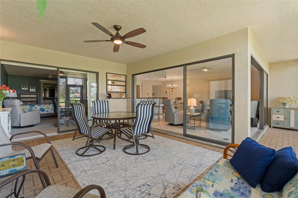 14770 Eagle Ridge Drive, Unit 112 Fort Myers, FL 33912 - Photo 20 of 32 a work room with furniture and view of kitchen