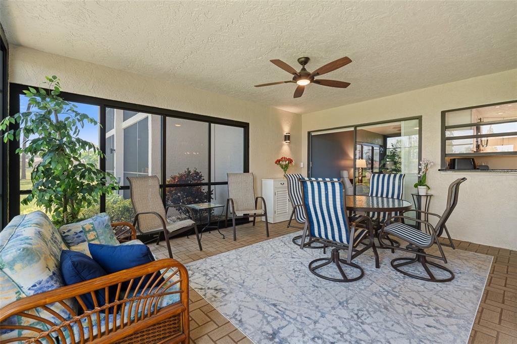 14770 Eagle Ridge Drive, Unit 112 Fort Myers, FL 33912 - Photo 21 of 32 a living room with furniture and a window