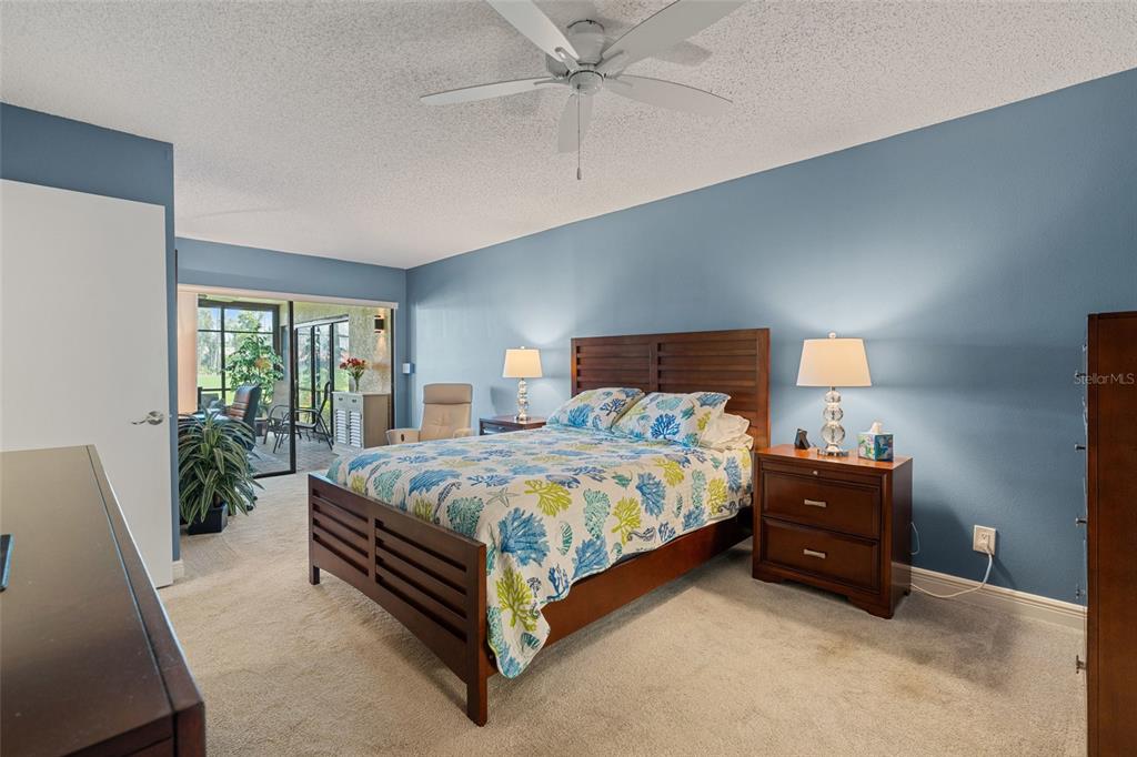 14770 Eagle Ridge Drive, Unit 112 Fort Myers, FL 33912 - Photo 10 of 32 a bedroom with a bed and window