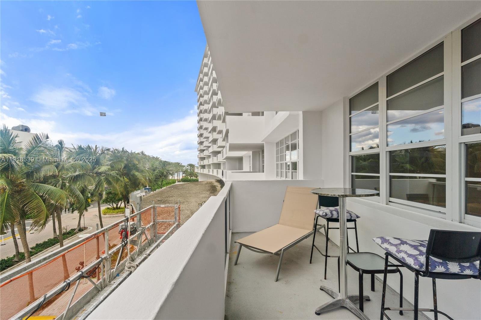 Miami Beach City Center Miami Beach, FL 33139 - Photo 1 of 15 a balcony with table and chairs