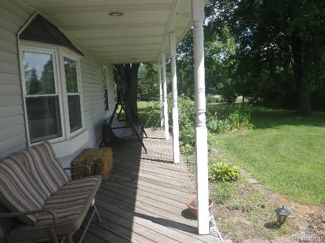5100 Coldwater Road Columbiaville, MI 48421 - Photo 2 of 19 Front Porch2.jpg