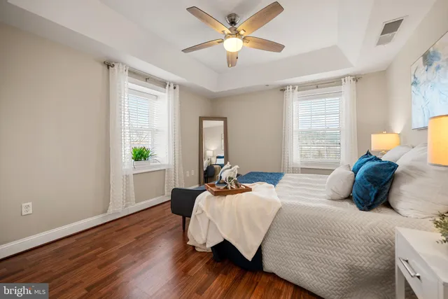 a bedroom with bed and window