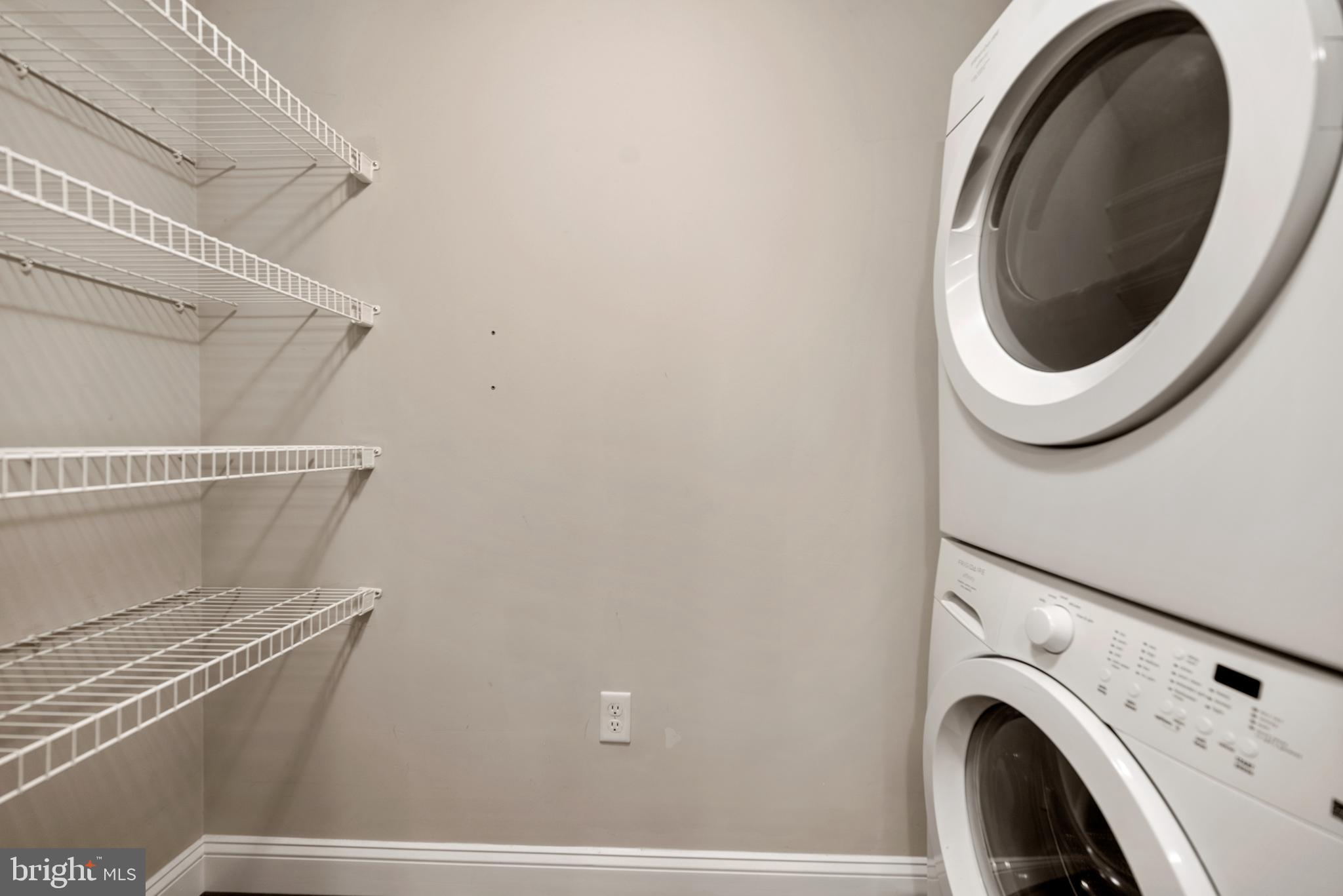 6301 Edsall Road, Unit 323 Alexandria, VA 22312 - Photo 13 of 27 a utility room with dryer and washer