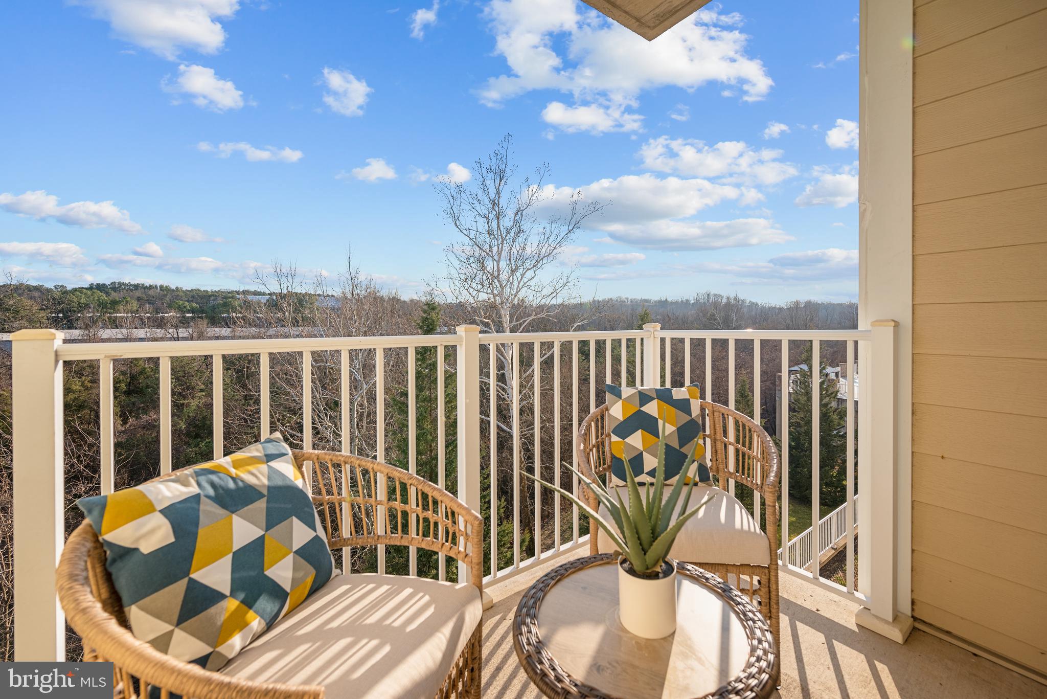 6301 Edsall Road, Unit 323 Alexandria, VA 22312 - Photo 14 of 27 a view of a balcony with chairs