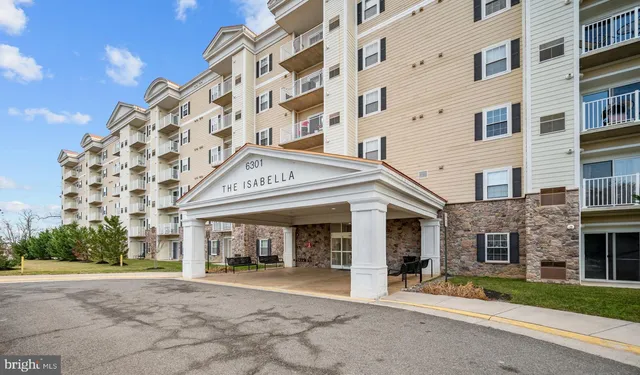 a view of a balcony with chairs