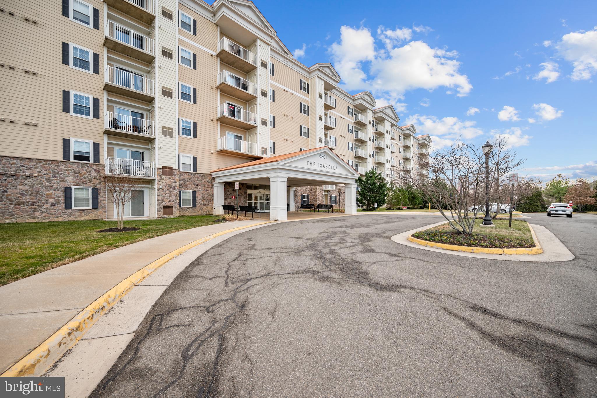 6301 Edsall Road, Unit 323 Alexandria, VA 22312 - Photo 17 of 27 a front view of a building with garden