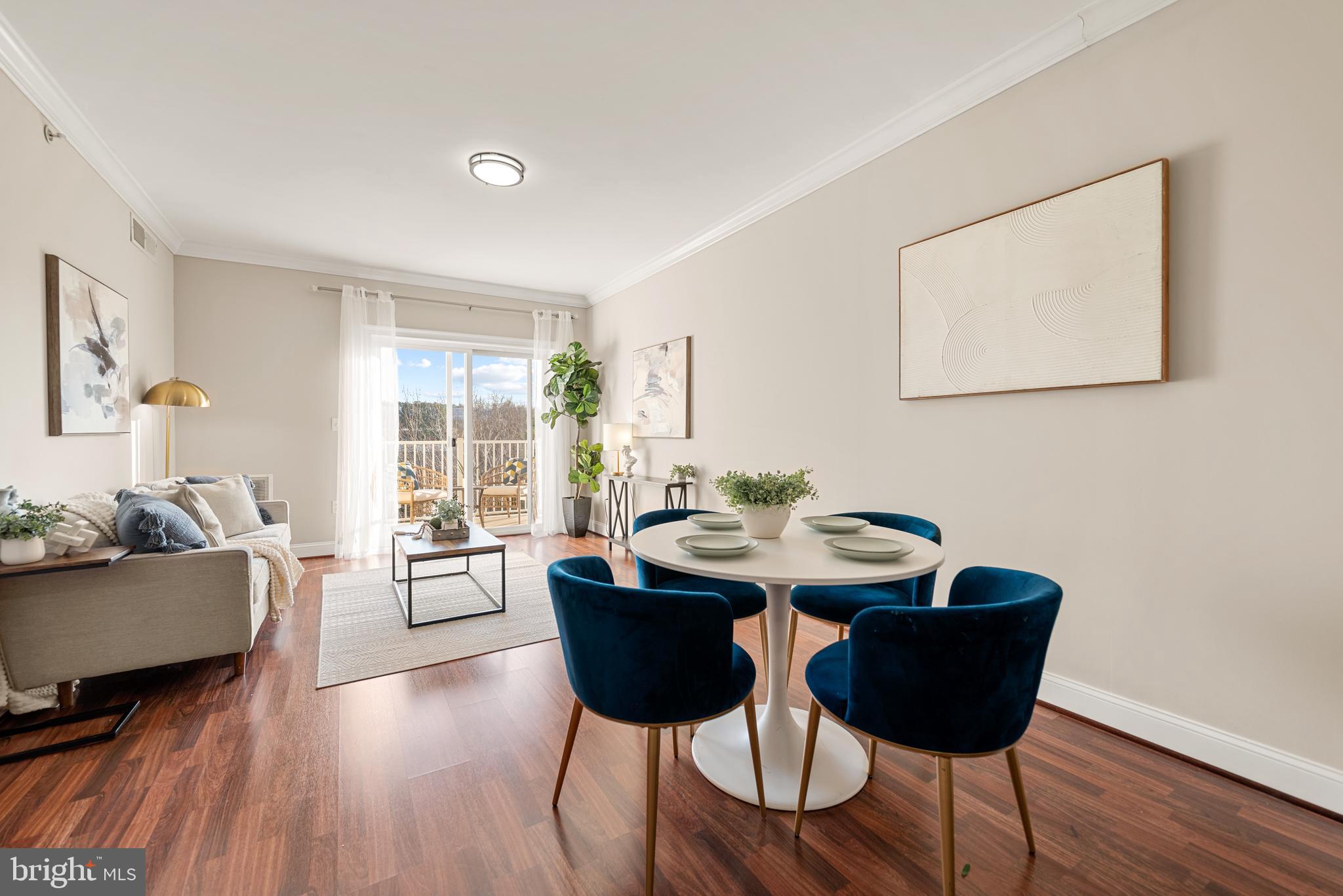 6301 Edsall Road, Unit 323 Alexandria, VA 22312 - Photo 26 of 27 a dining room with furniture and wooden floor