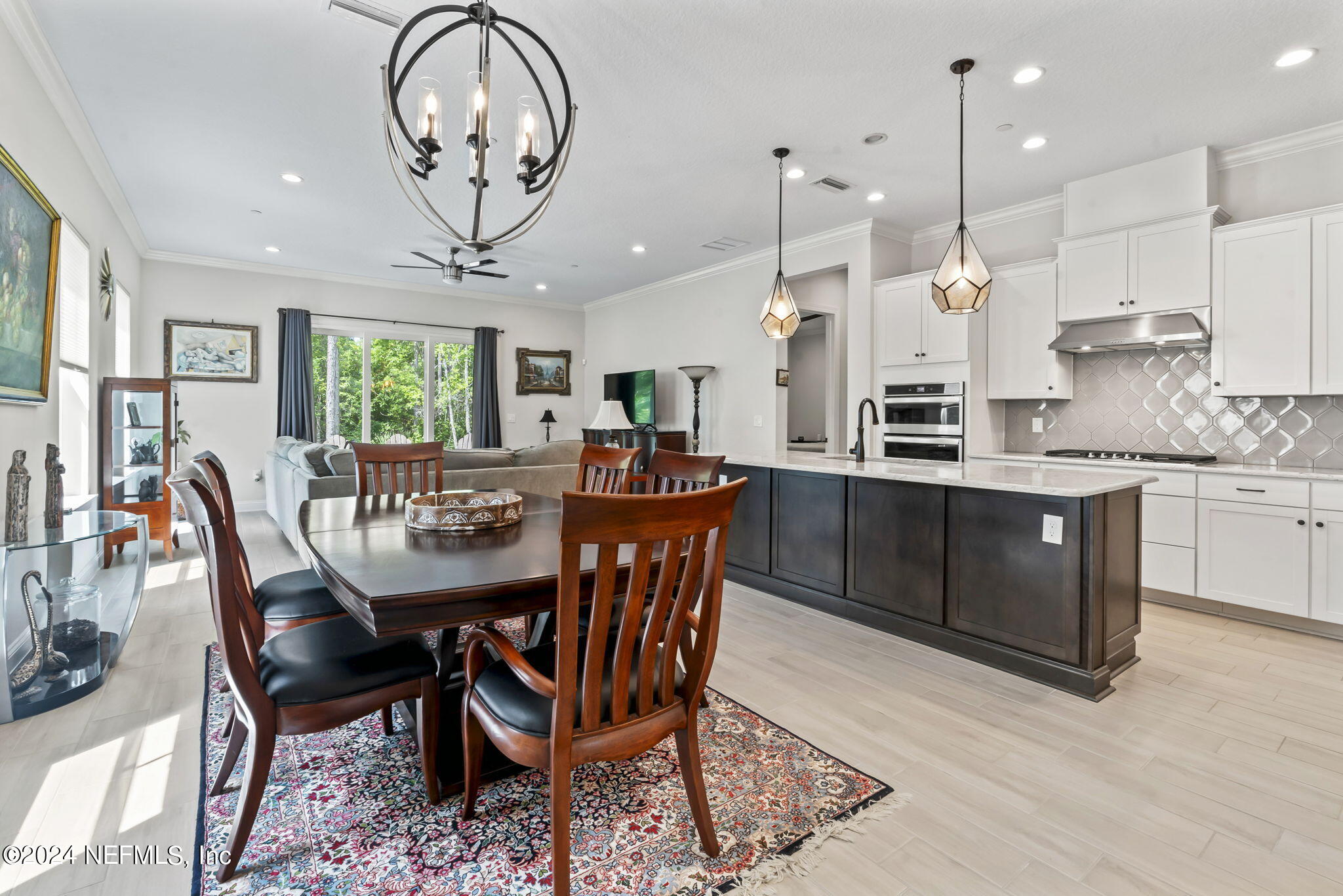 98 Liberty Bell Road Ponte Vedra, FL 32081 - Photo 8 of 109 a view of a dining room with furniture window and wooden floor