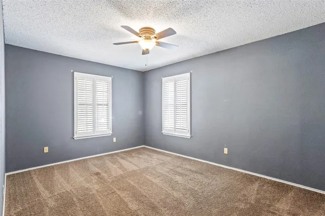 en view of an empty room with a window