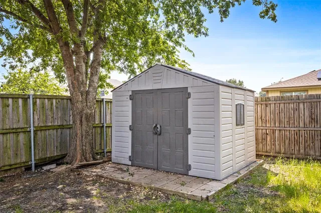 a house view with a backyard space