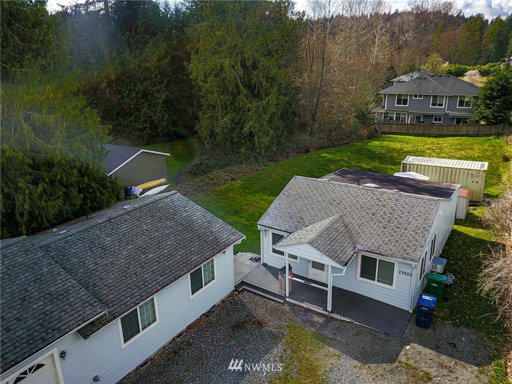 23920 Brier Road Brier, WA 98036 - Photo 23 of 23 a aerial view of a house next to a big yard and large trees