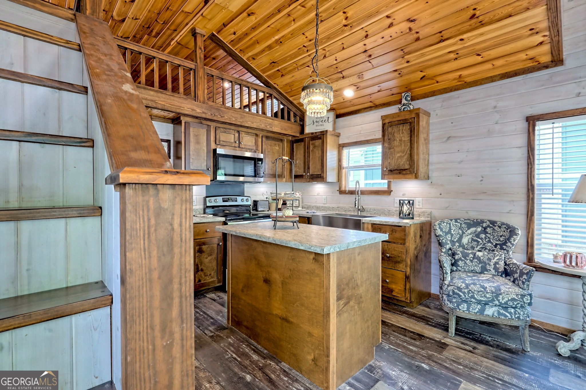 4960 Laurel Lodge Road Clarkesville, GA 30523 - Photo 19 of 29 a kitchen with stainless steel appliances granite countertop a refrigerator and a stove top oven