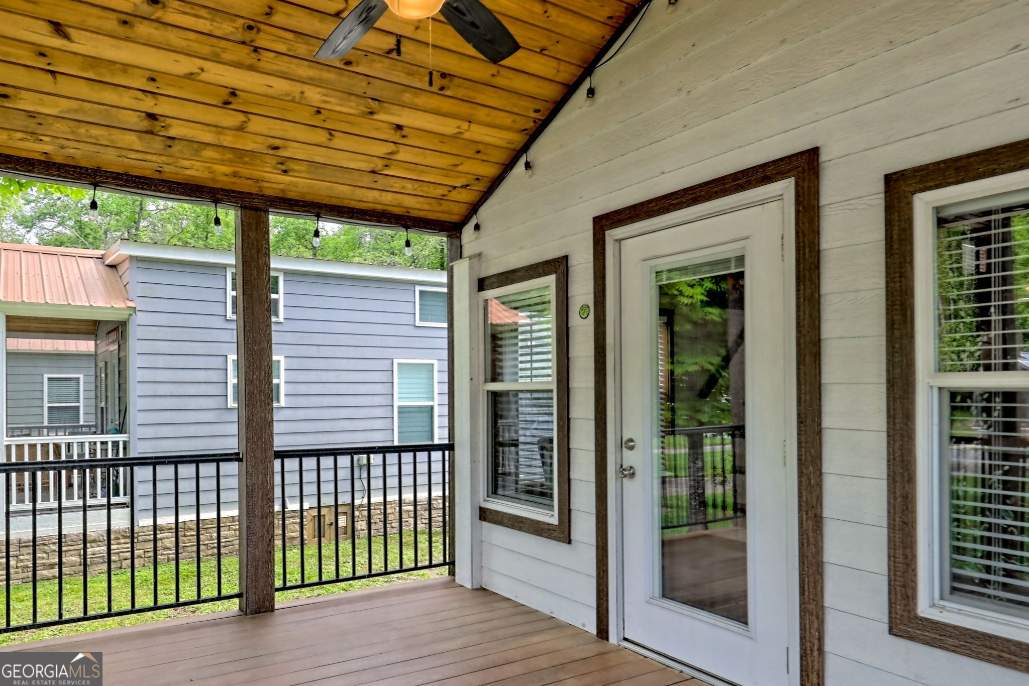 4960 Laurel Lodge Road Clarkesville, GA 30523 - Photo 3 of 29 a view of a backyard with porch