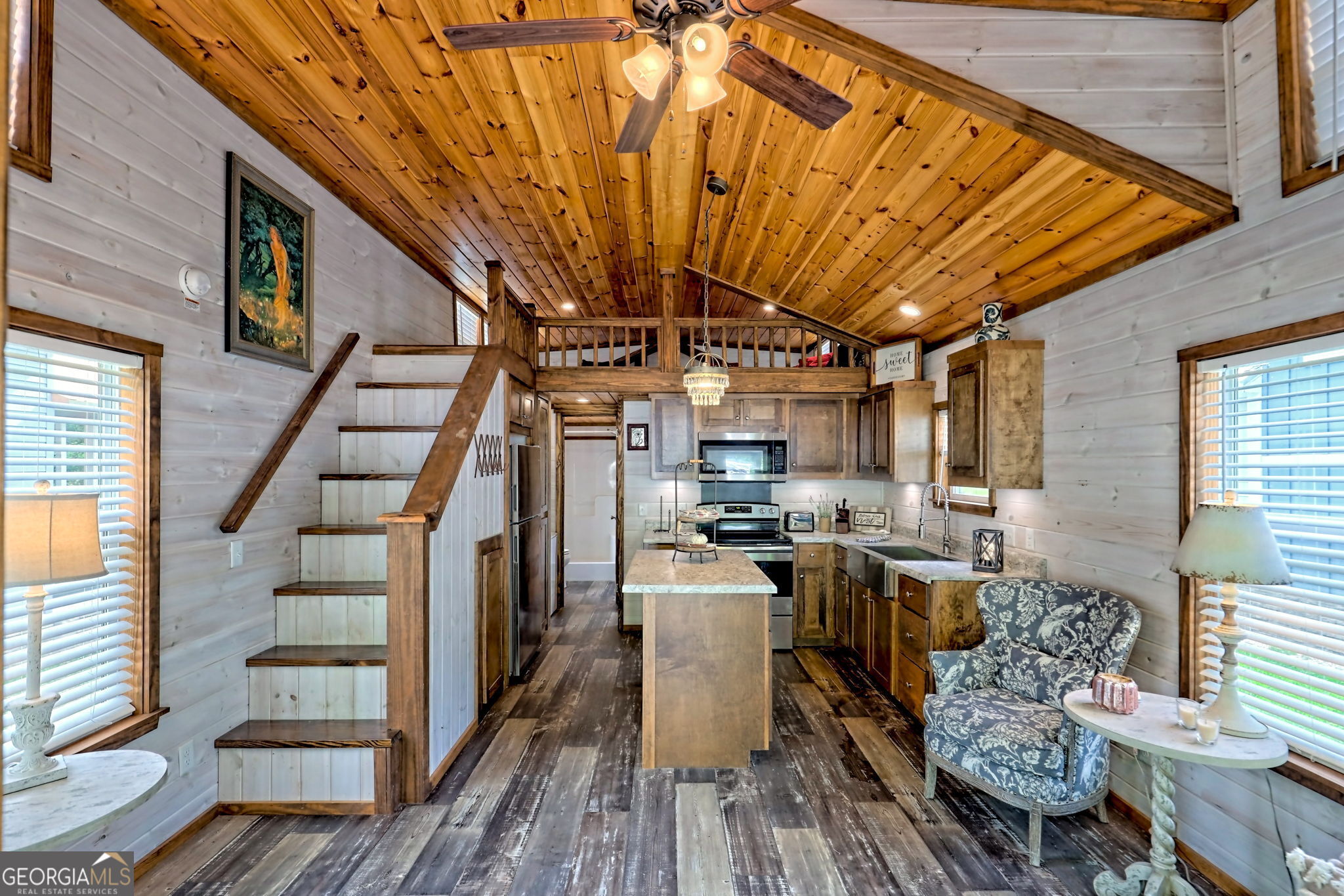 4960 Laurel Lodge Road Clarkesville, GA 30523 - Photo 5 of 29 a view of a chairs and table in the balcony
