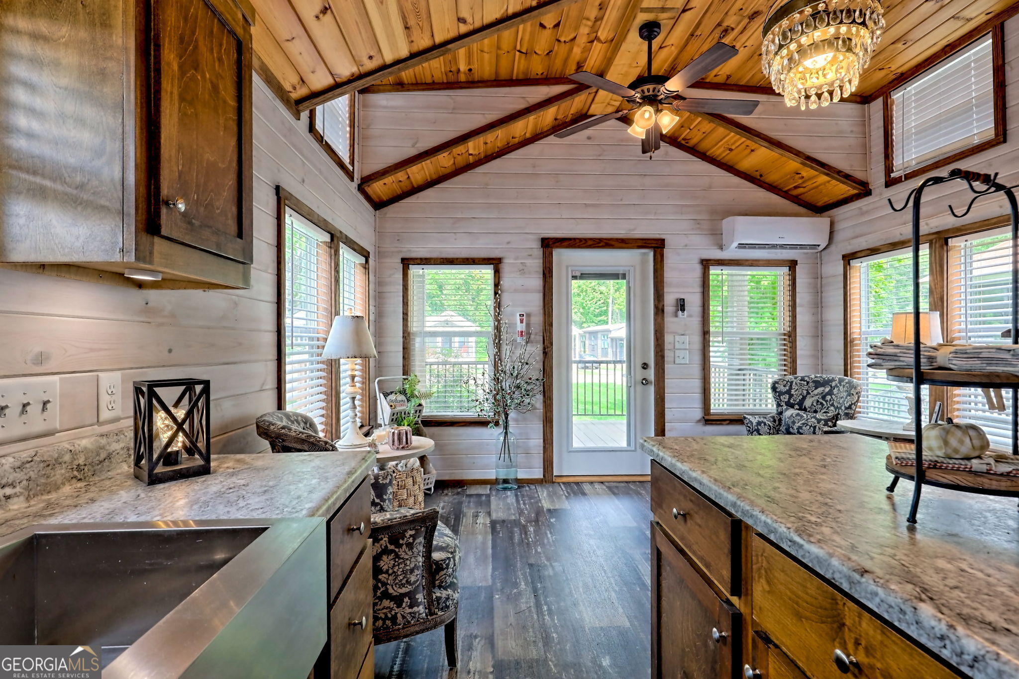 4960 Laurel Lodge Road Clarkesville, GA 30523 - Photo 9 of 29 a kitchen with a counter space a sink and cabinets