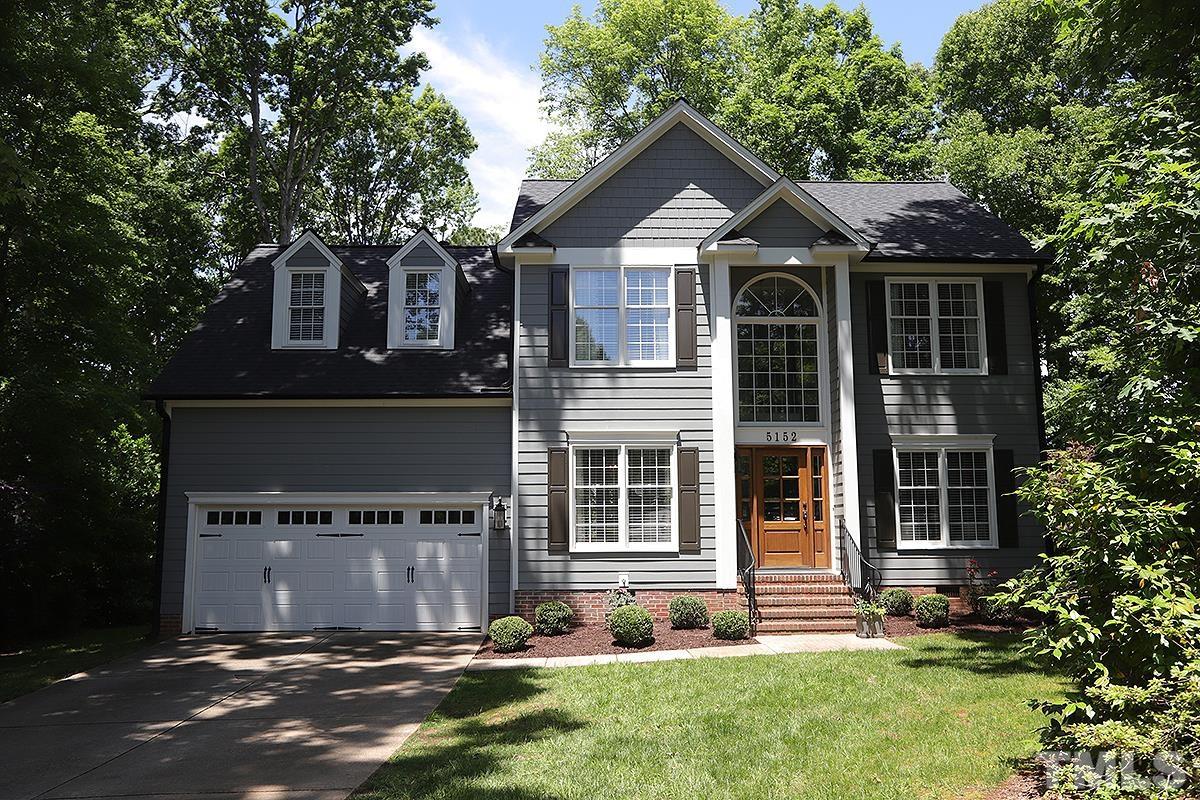 5152 Fairmead Circle Raleigh, NC 27613 - Photo 1 of 25 front view of a house with a yard