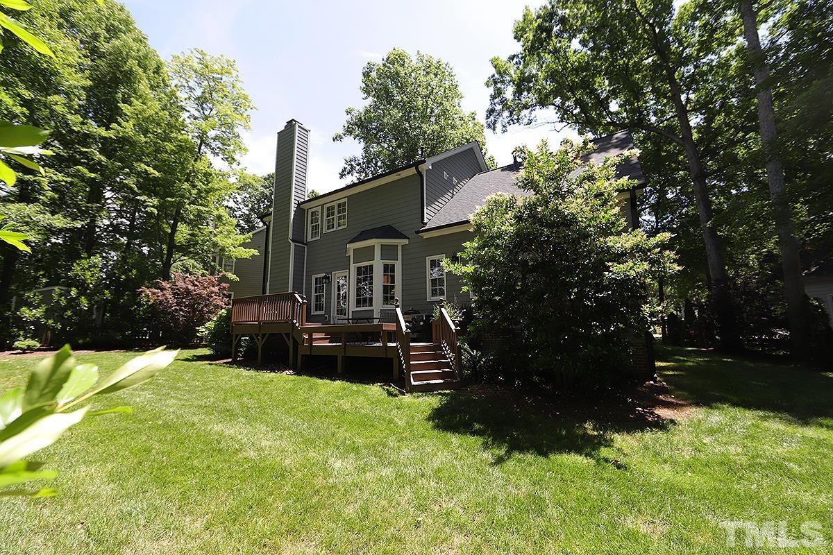 5152 Fairmead Circle Raleigh, NC 27613 - Photo 23 of 25 a view of a house with a yard