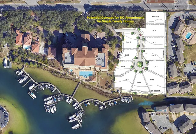 an aerial view of a balcony with chairs