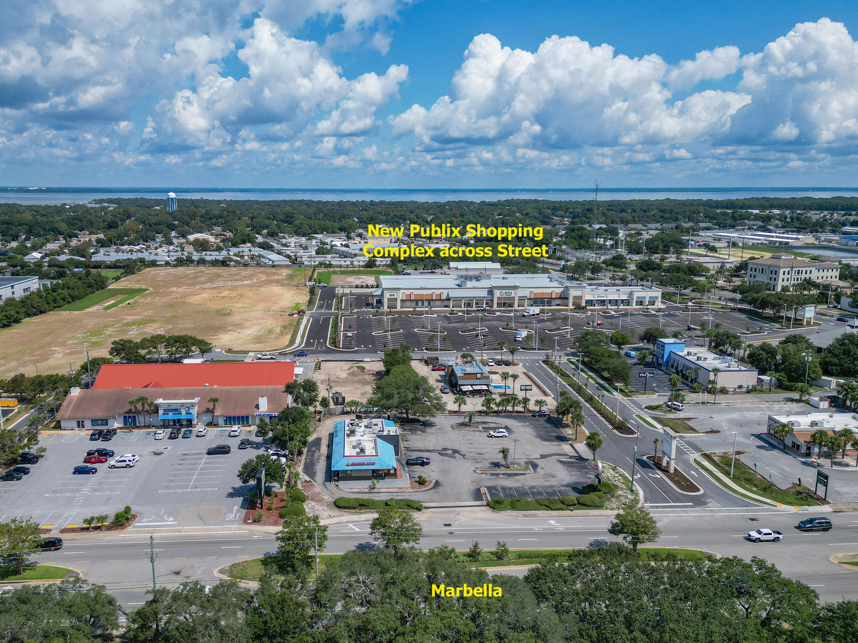 796 Harbor Boulevard Destin, FL 32541 - Photo 6 of 14 an aerial view of residential building and lake
