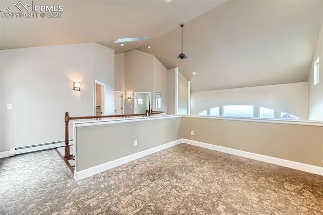 a view of a kitchen with a sink and a window