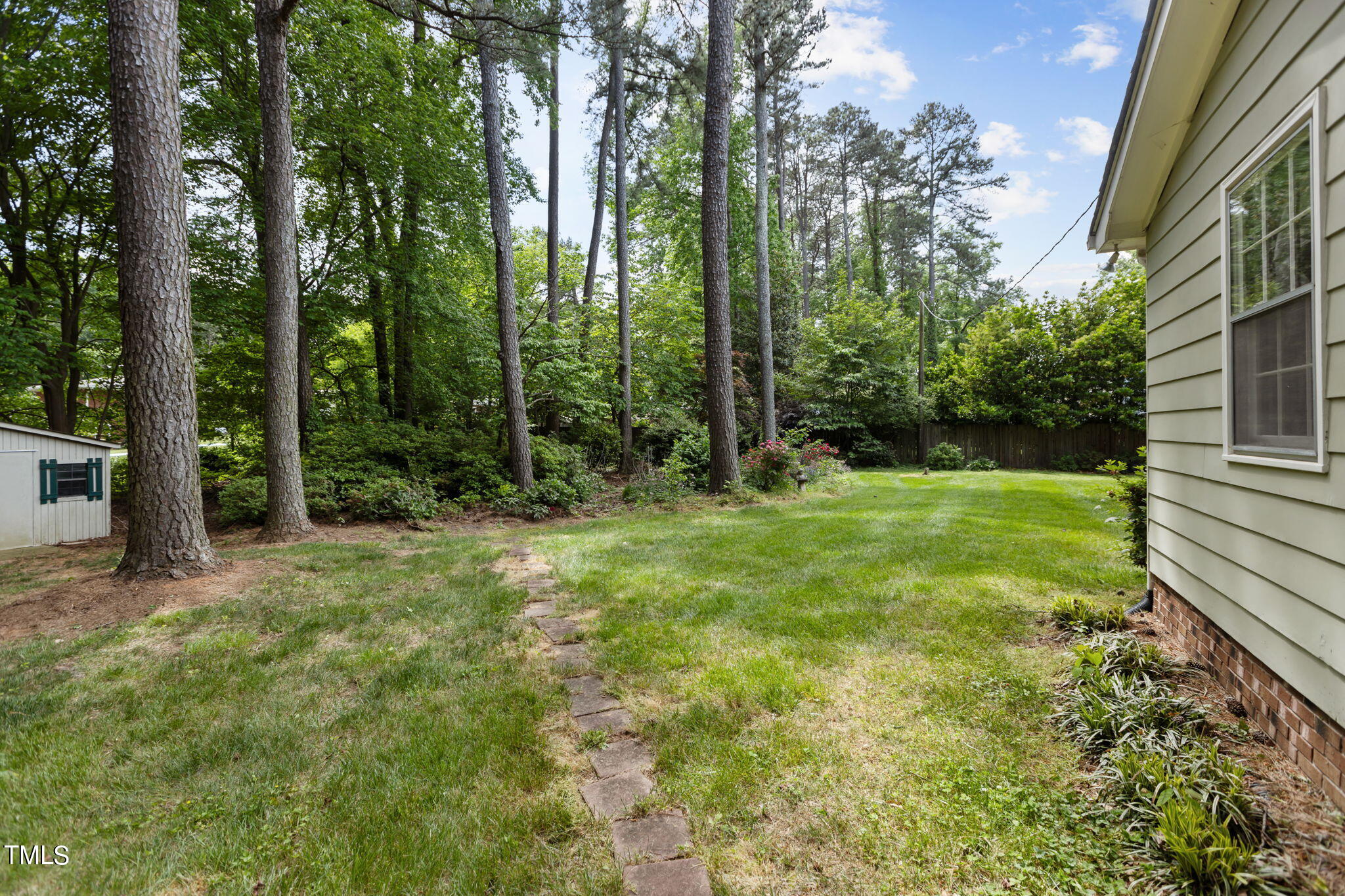 6401 Wrenwood Avenue Raleigh, NC 27607 - Photo 26 of 32 a view of outdoor space with deck and yard