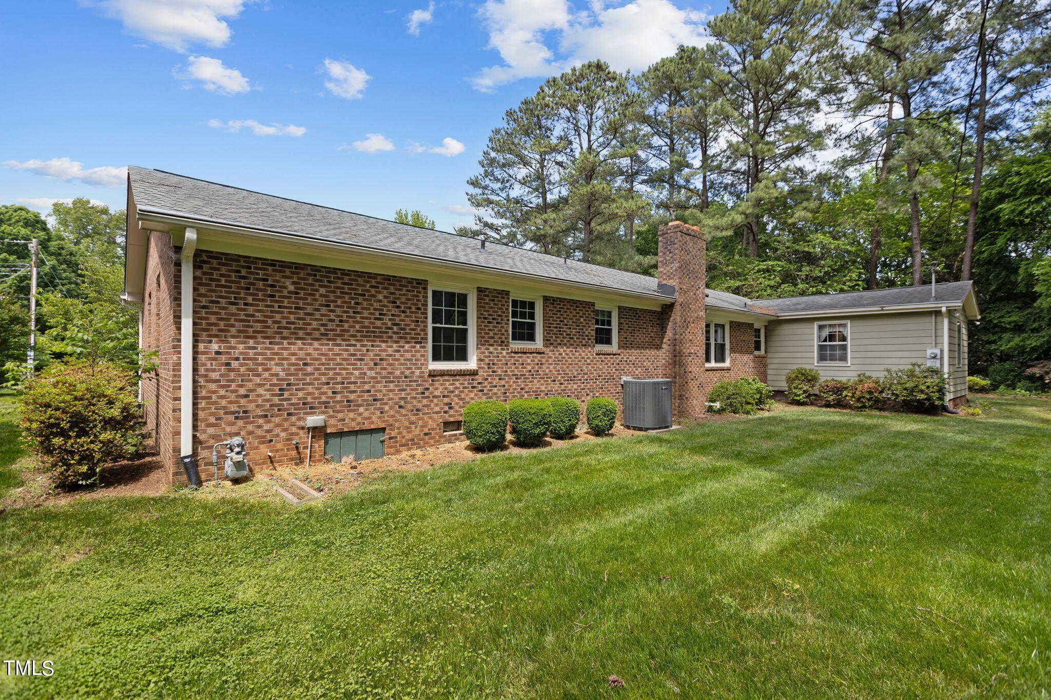 6401 Wrenwood Avenue Raleigh, NC 27607 - Photo 28 of 32 a front view of house with yard and green space