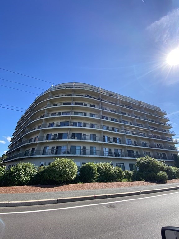 133 Commander Shea Boulevard, Unit 711 Quincy, MA 02171 - Photo 21 of 21 a view of a tall building next to a road