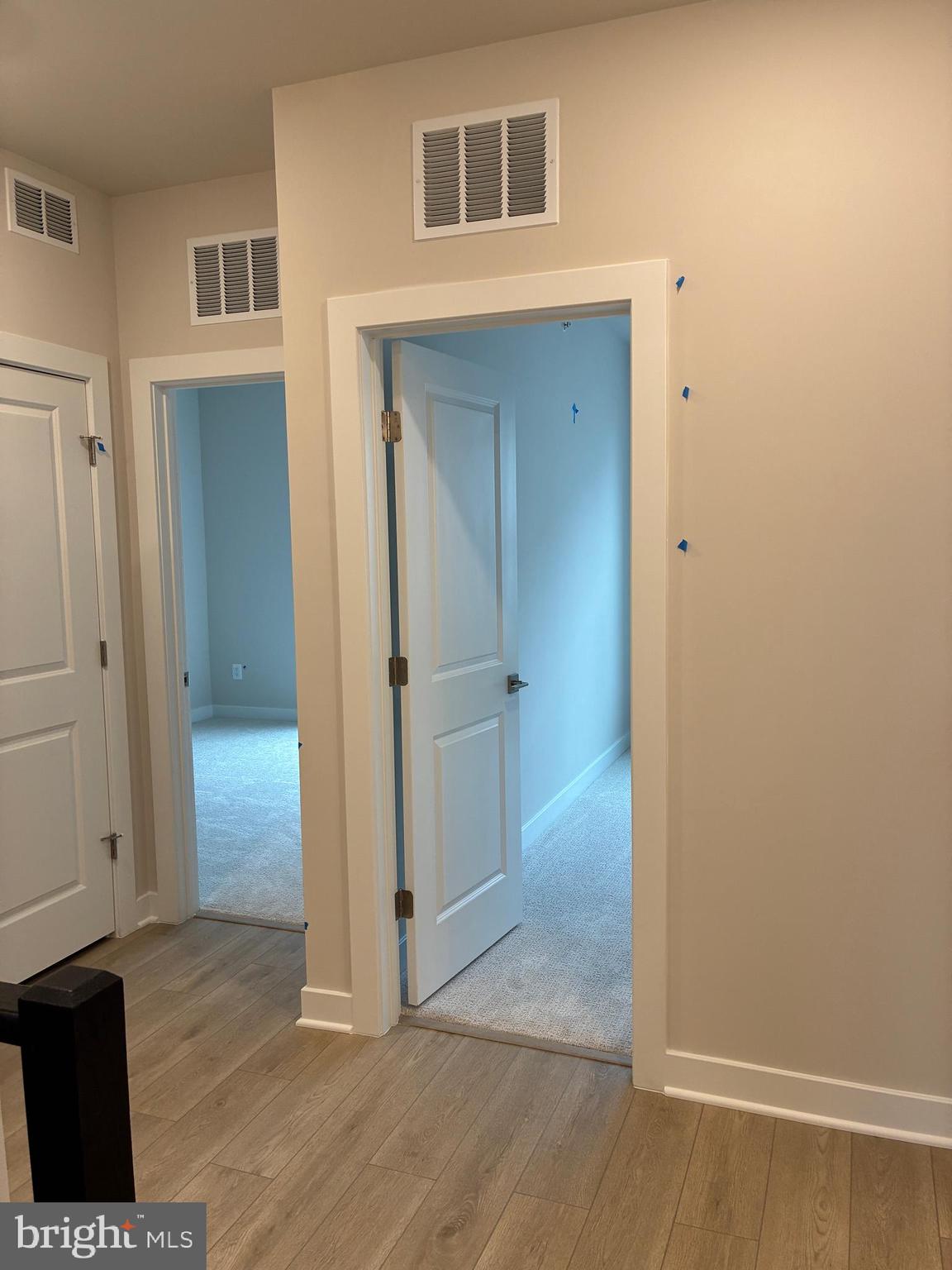 44586 Strabane Terrace Ashburn, VA 20147 - Photo 7 of 15 an empty room with windows and entrance