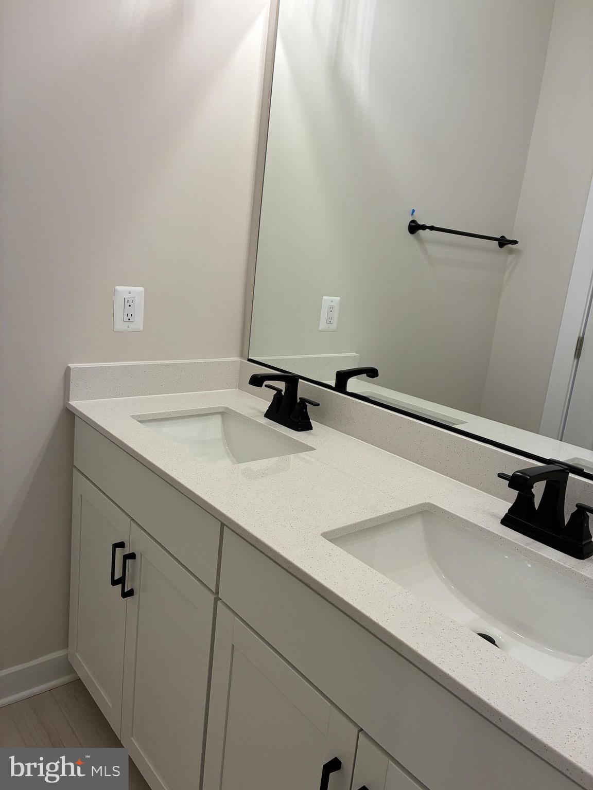 44586 Strabane Terrace Ashburn, VA 20147 - Photo 9 of 15 a bathroom with a sink and vanity