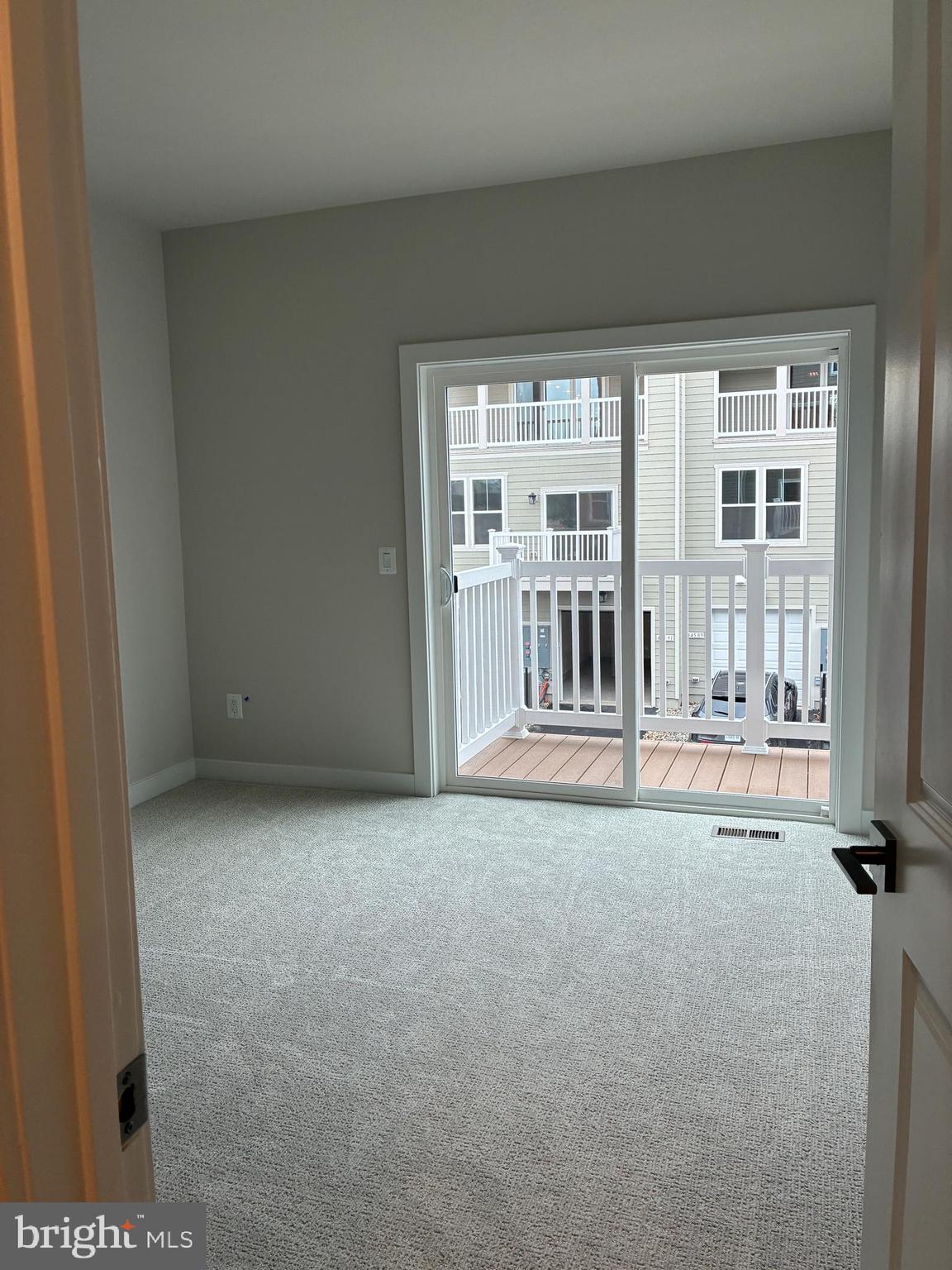 44586 Strabane Terrace Ashburn, VA 20147 - Photo 10 of 15 a view of an empty room with a fireplace