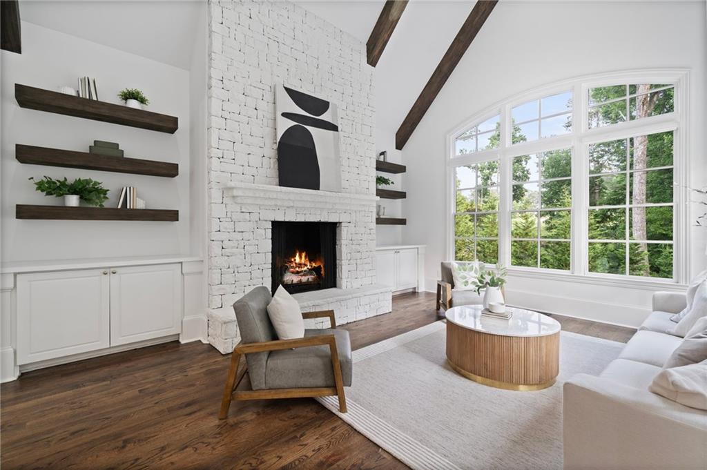 3213 Balley Forrest Drive Milton, GA 30004 - Photo 22 of 90 a living room with furniture large window and fireplace