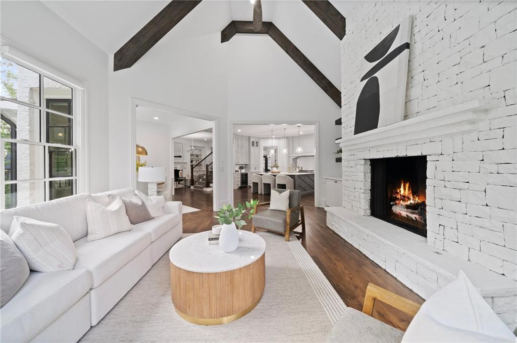 3213 Balley Forrest Drive Milton, GA 30004 - Photo 23 of 90 a living room with furniture and a fireplace