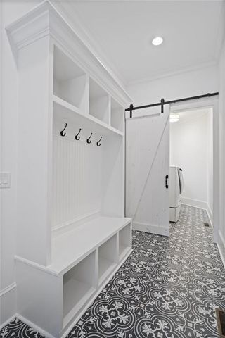 an empty room with a ceiling fan and window