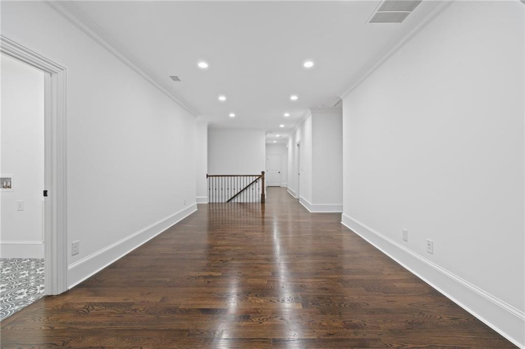 3213 Balley Forrest Drive Milton, GA 30004 - Photo 39 of 90 a view of empty room with wooden floor
