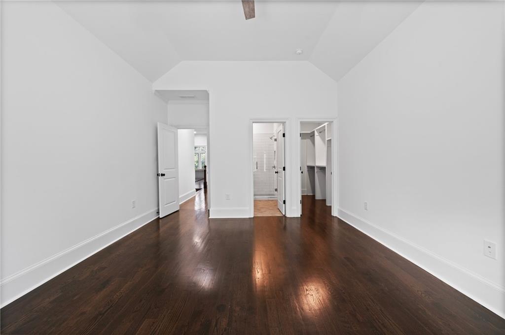 3213 Balley Forrest Drive Milton, GA 30004 - Photo 47 of 90 a view of an empty room with wooden floor and closet