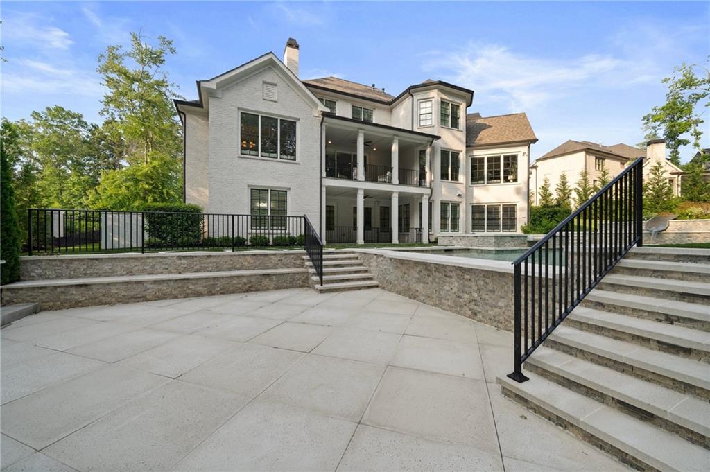 3213 Balley Forrest Drive Milton, GA 30004 - Photo 79 of 90 a front view of a house with a porch