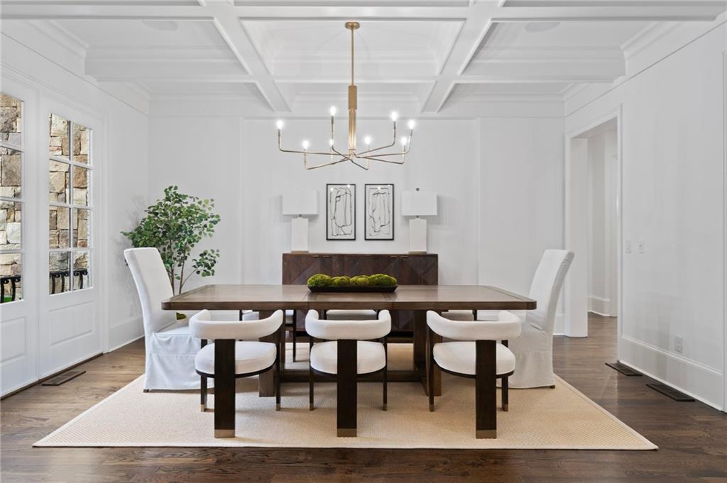 3213 Balley Forrest Drive Milton, GA 30004 - Photo 9 of 90 a view of a dining room with furniture and chandelier