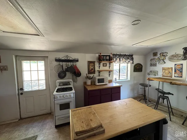 a bedroom with a bed and furniture