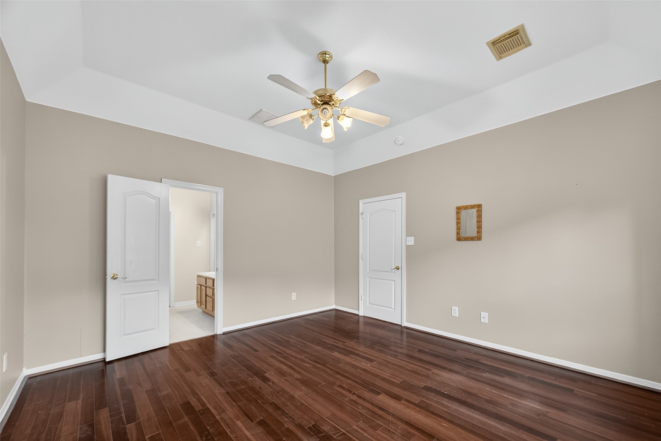 19207 Pinewood Mist Lane Humble, TX 77346 - Photo 13 of 29 a view of an empty room with wooden floor